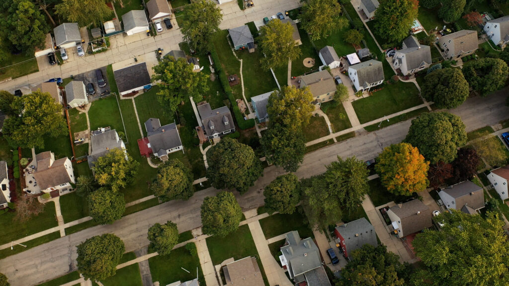 Aerial neighborhood view of lushbackyards