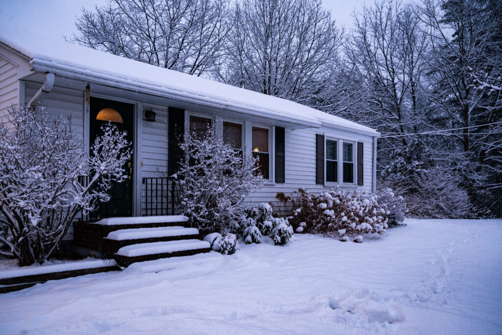 House covered by snow in winter season in Maine, USA